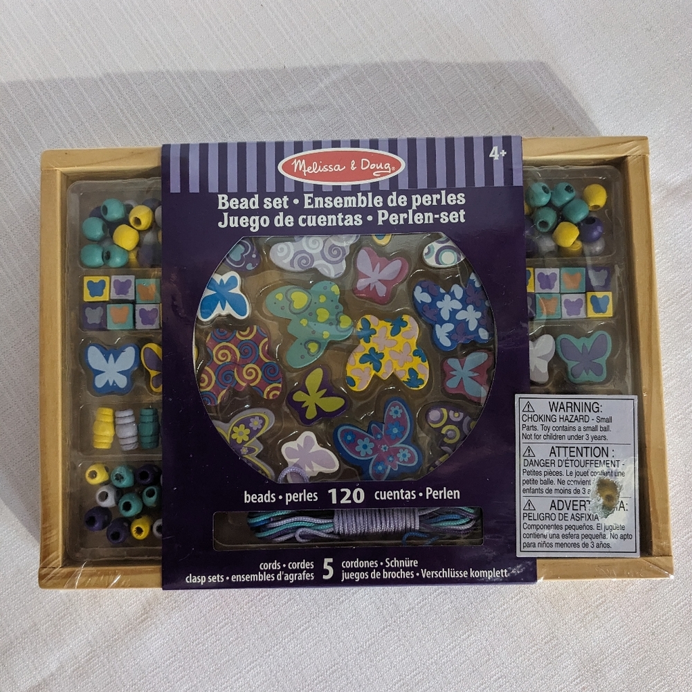 Factory sealed Melissa and Doug wooden bead set (butterfly friends) age 4+